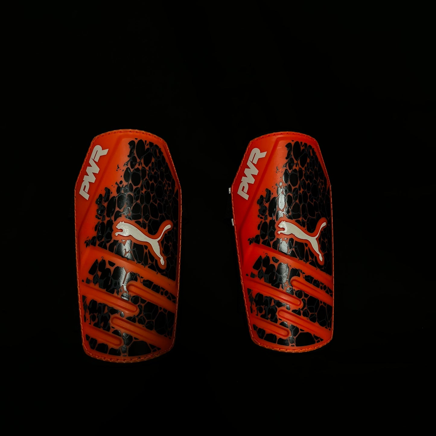 Protège tibia puma PWR - Orange/Noir